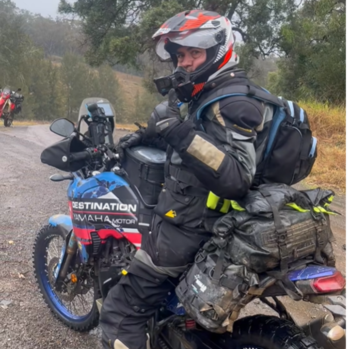 Rider on adventure bike with waterproof soft luggage