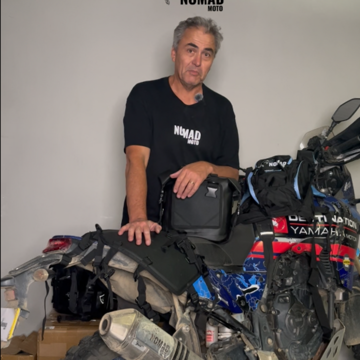 Rider with waterproof soft luggage on motorcycle